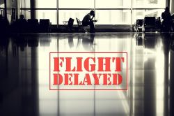 Photo présentant la mention flight delayed